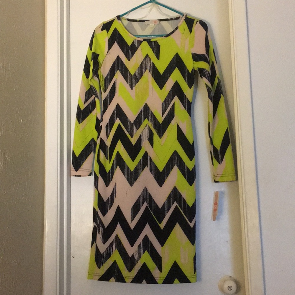 Above the knee bright bodycon dress.